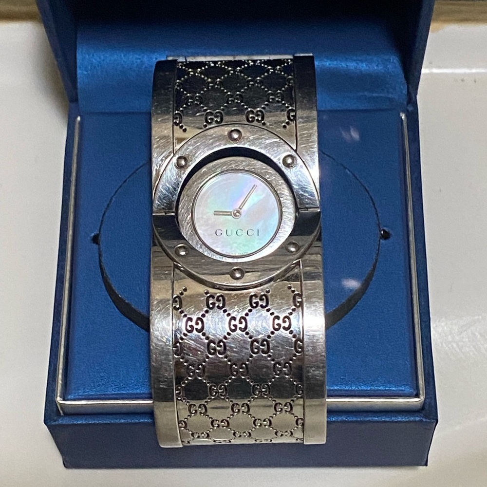 Gucci twirl watch.